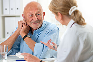 Doctor talking to patient